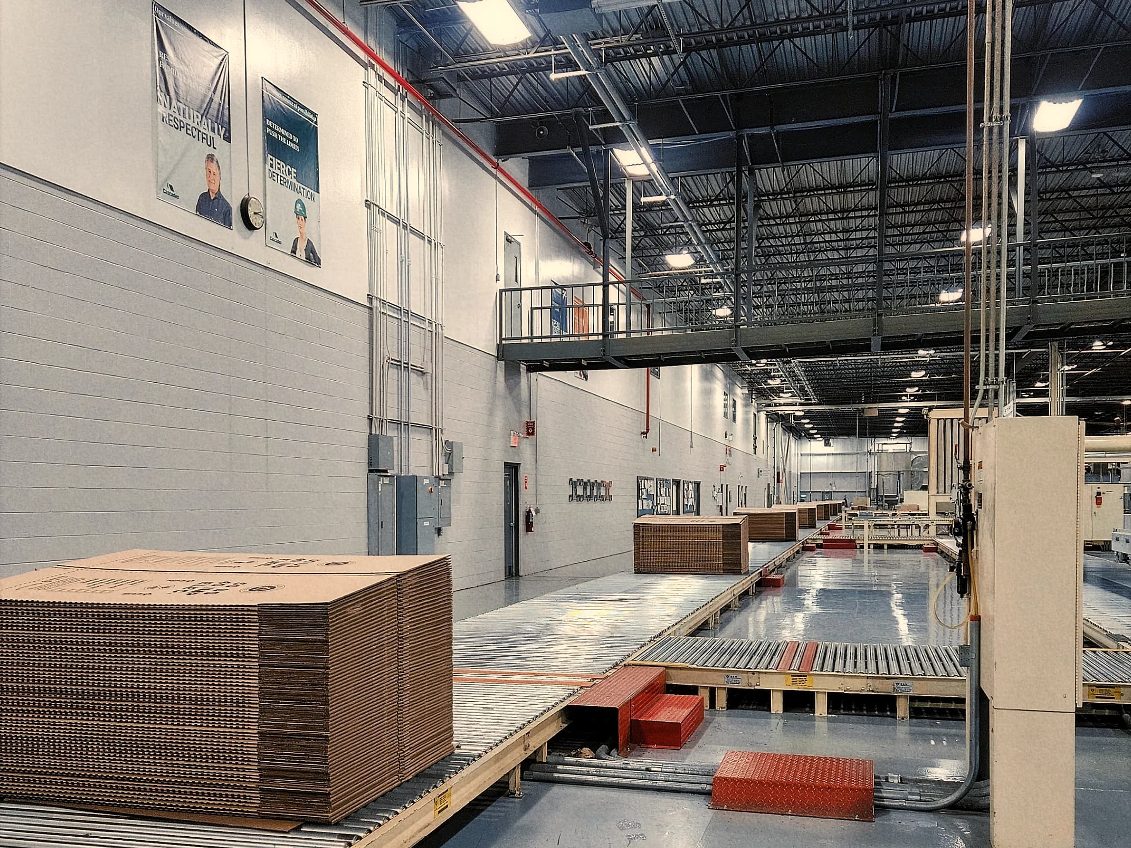 Corrugated cardboard sheets moving on a conveyor